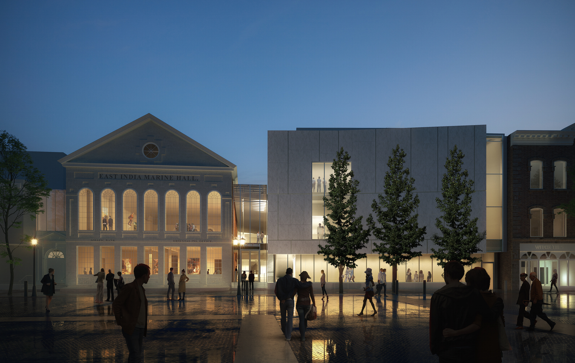 night blue sky with greek revival museum light up and black silhouettes of several people and 3 trees in front