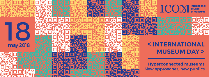 A quilt of purple, orange, green and white QR codes with a red grid like pattern on top