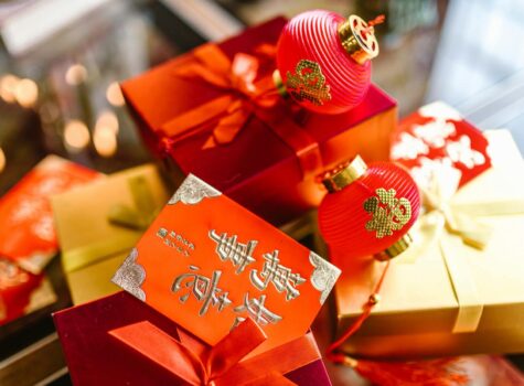 red cards and gold boxes with gold Chinese words
