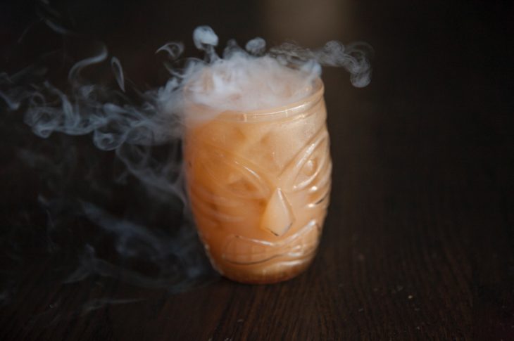 tiki orange cocktail with smoke