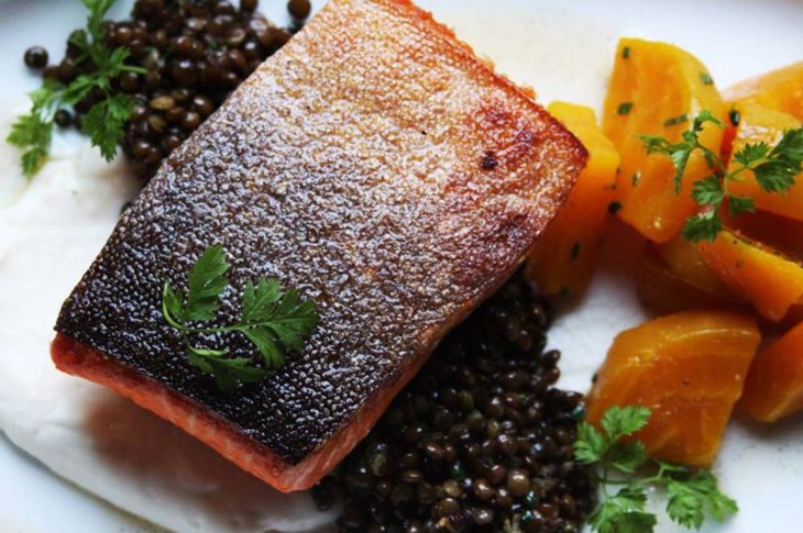 salmon with black caviar and orange potatoes